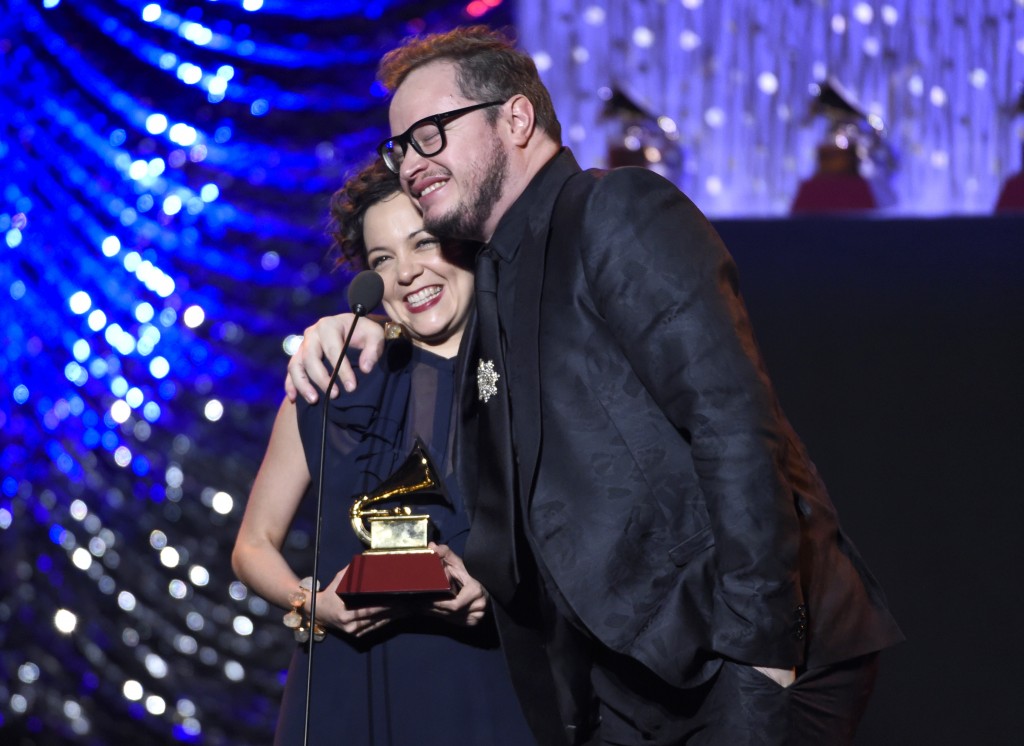Natalia Lafourcade, left, and Leonel Garcia accept the award for best alternative song for "Hasta La Raiz" at the 16th annual Latin Grammy Awards on Thursday, Nov. 19, 2015, in Las Vegas. (Photo by Chris Pizzello]/Invision/AP)
