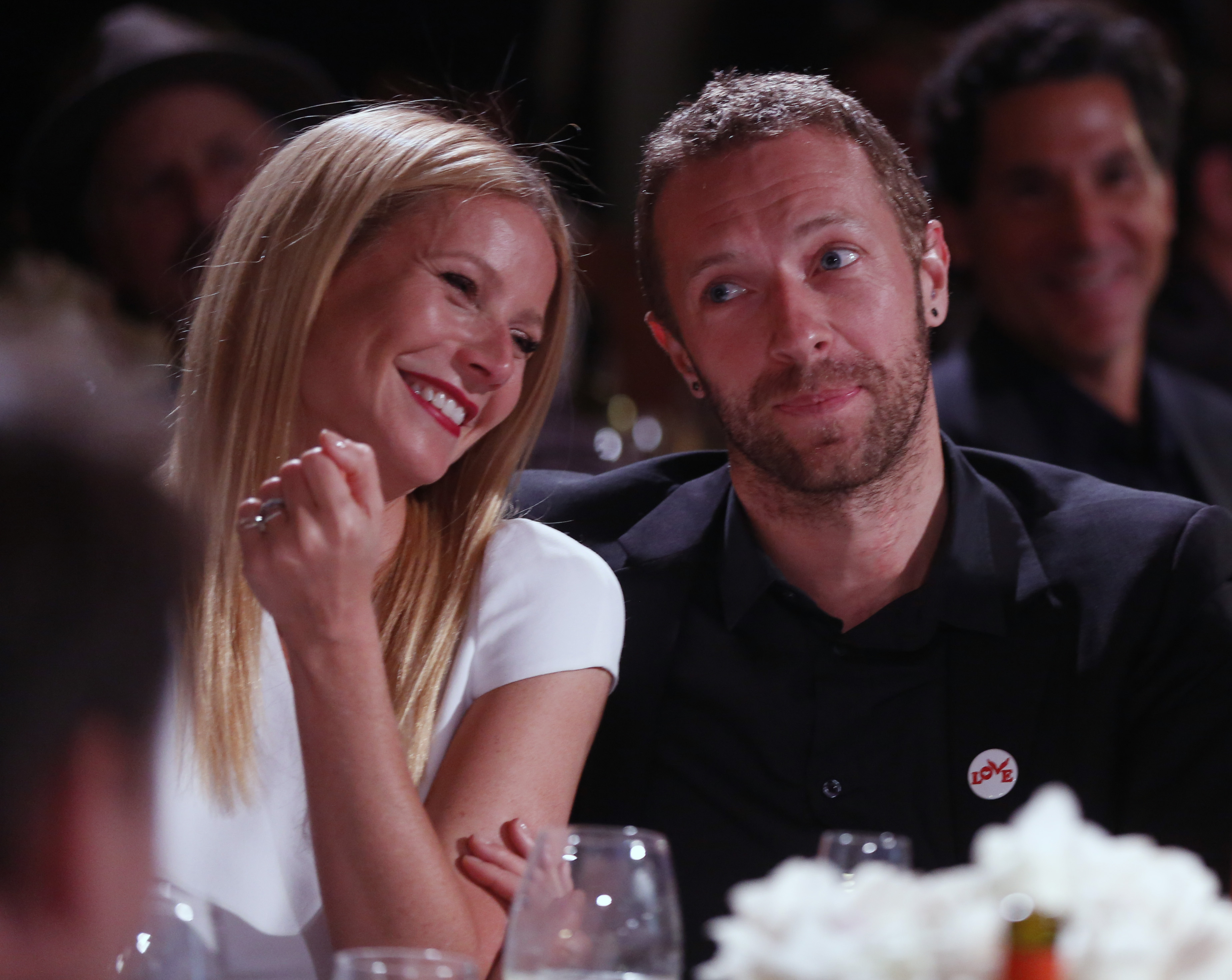 Gwyneth Paltrow, left, and Chris Martin are seen at the 3rd Annual Sean Penn & Friends HELP HAITI HOME Gala on Saturday, Jan. 11, 2014 at the Montage Hotel in Beverly Hills, Calif. (Photo by Colin Young-Wolff /Invision/AP)