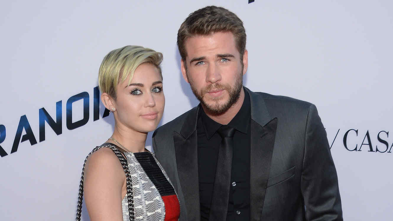 LOS ANGELES, CA - AUGUST 08:  Miley Cyrus and Liam Hemsworth attend the premiere of Relativity Media's "Paranoia" at DGA Theater on August 8, 2013 in Los Angeles, California.  (Photo by Jason Kempin/Getty Images)