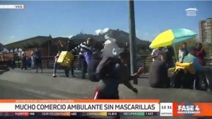 Equipo de Tele 13 fue atacado por vendedores ambulantes