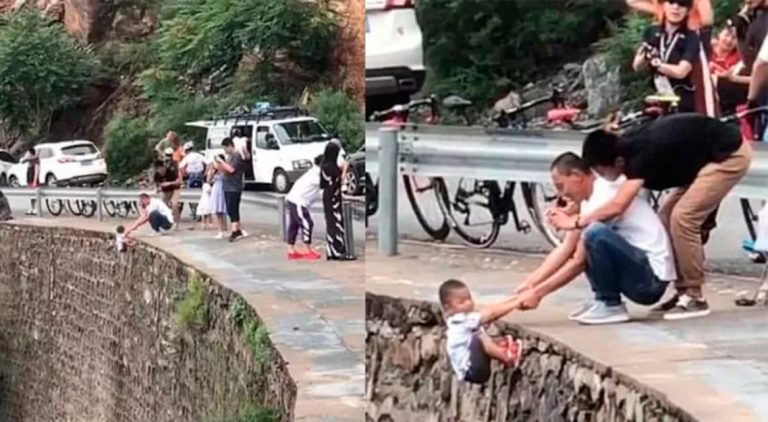 Video de padre colgando a su hijo de un abismo en China causa indignación mundial