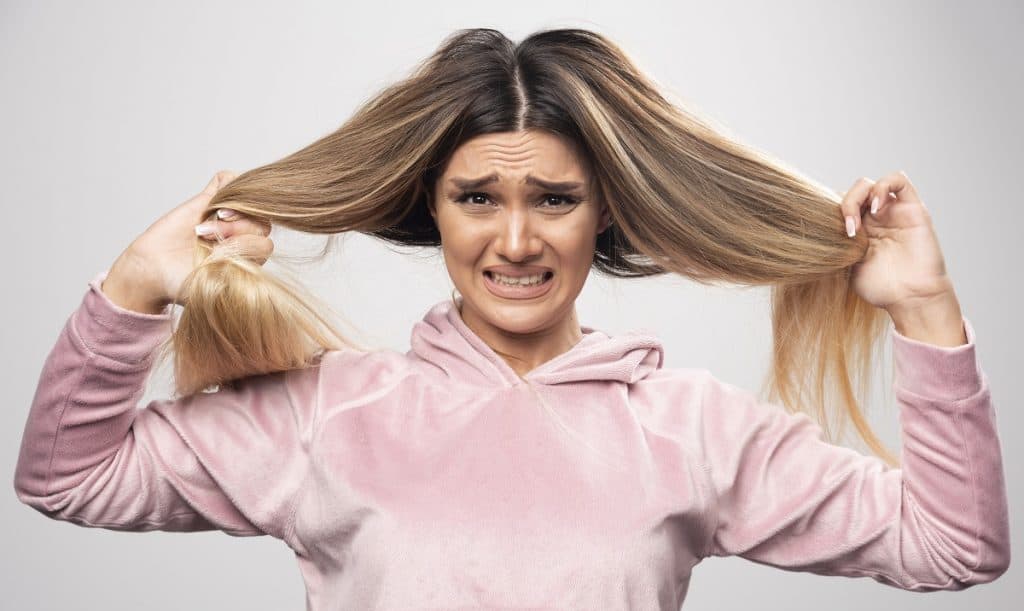 cómo hidratar el cabello seco la clave es el aceite de coco