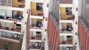 "¿De dónde salió ese tipo?": Hombre extranjero fue grabado trepando por balcones de un edificio en Alto Hospicio